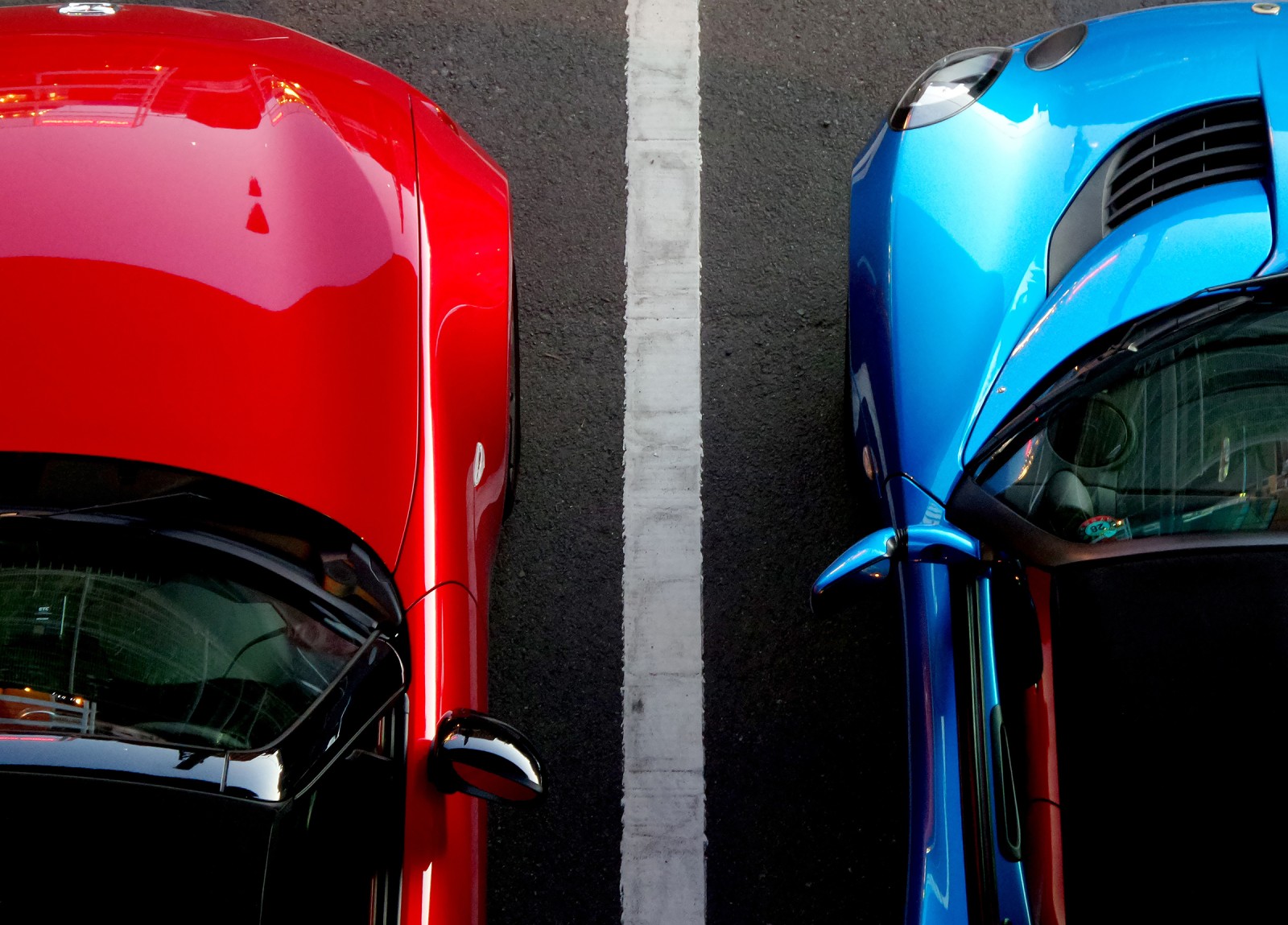 A red and blue car seen from above