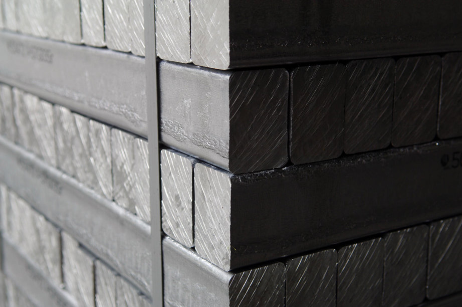 a stack of rectangular metal bars