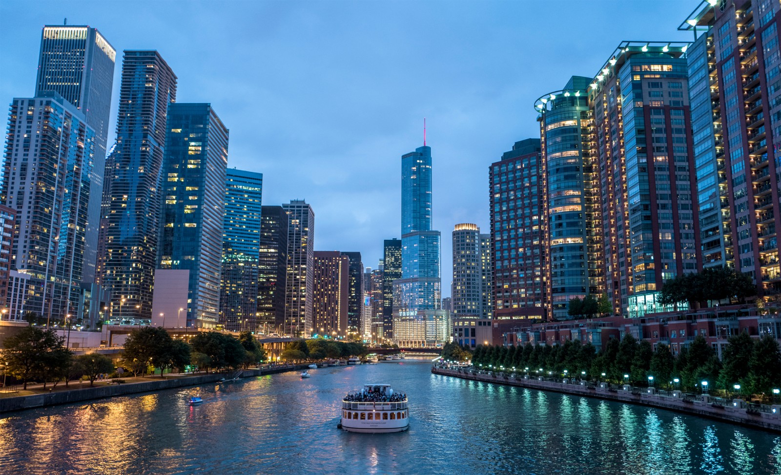 a boat in a river in a city