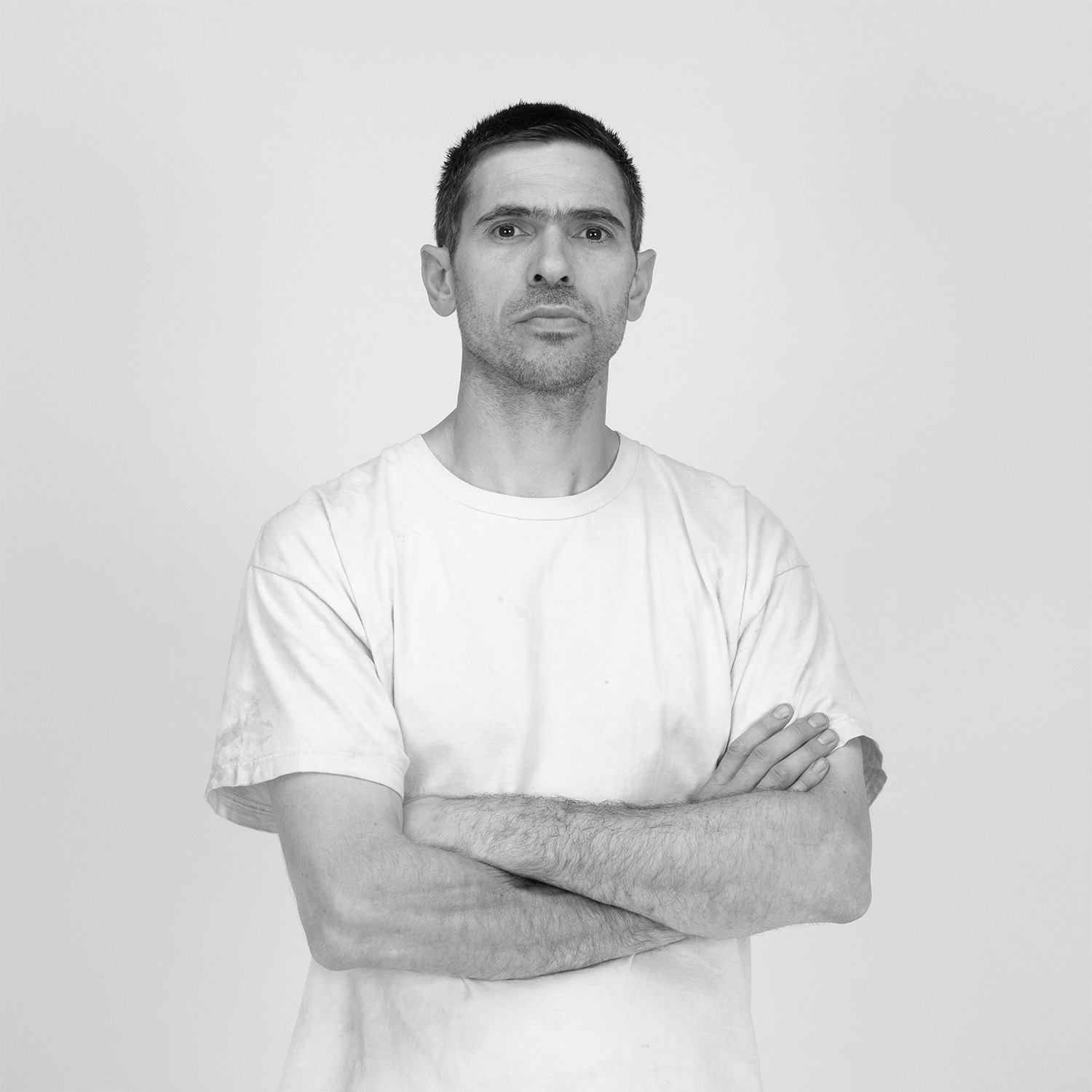 a man with his arms crossed