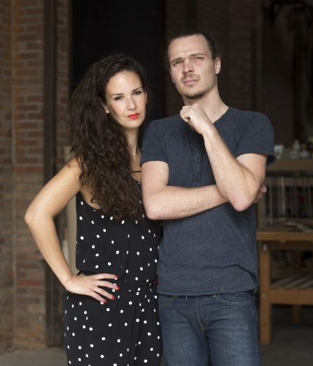 a man and woman posing for a picture