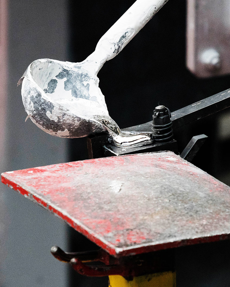 a spoon on a metal surface