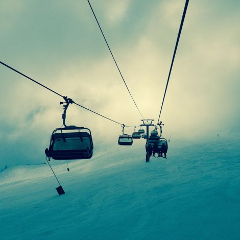 ski lift over snow slopes