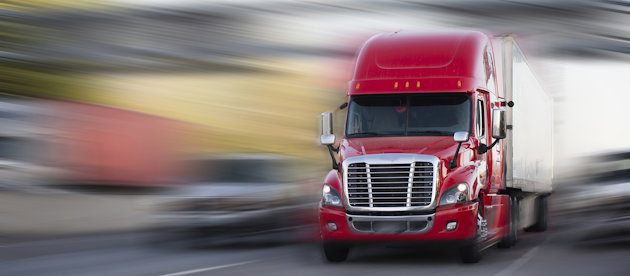 a red truck on a road