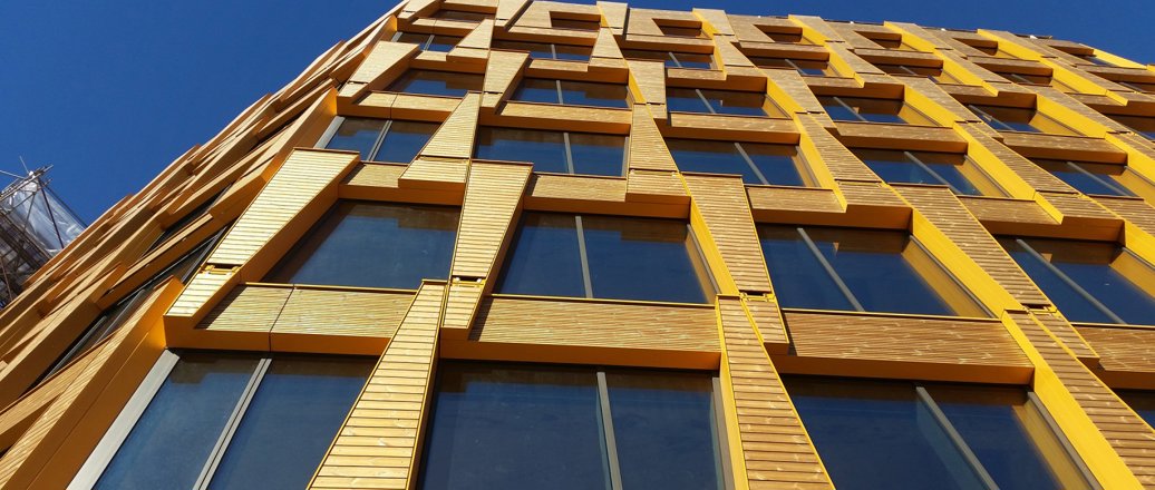 building facade with wood and glass