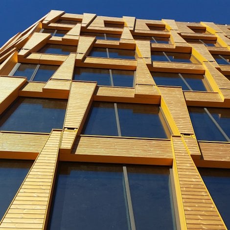 building facade with wood and glass