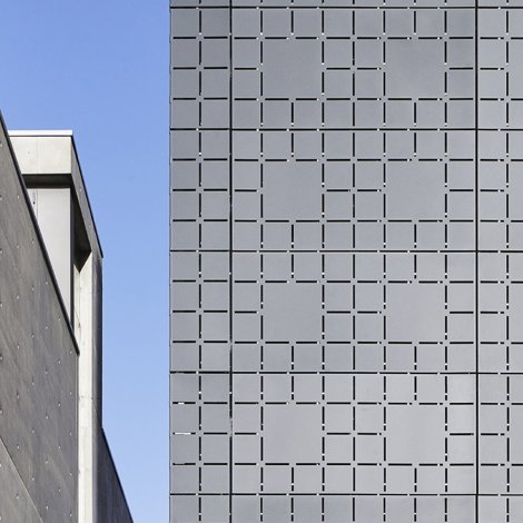 Multi story building with grey metallic sidings