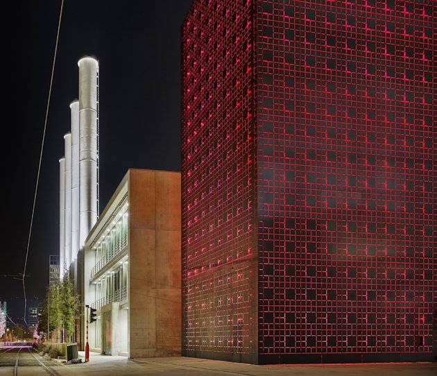 Multi story building with dark panels with contrast details