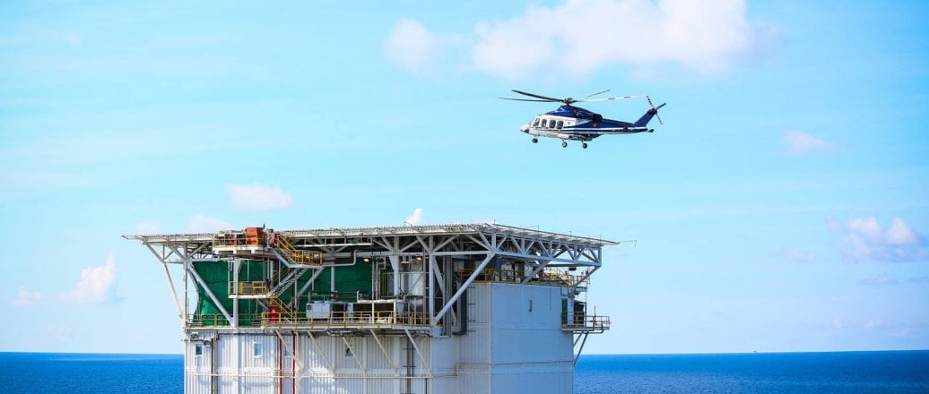a helicopter landing on an offshore installation