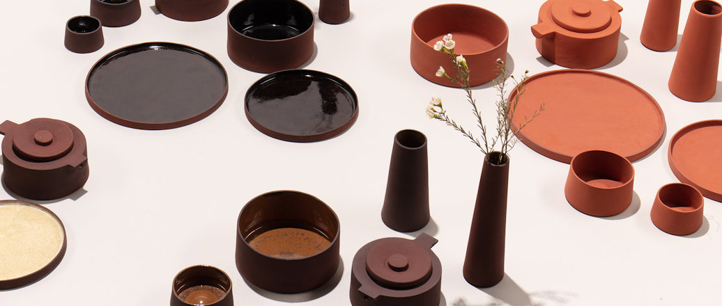 Studio ThusThat has created a range of tableware and tiles made from bauxite residue.