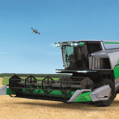 A futuristic harvester, observed by a small drone